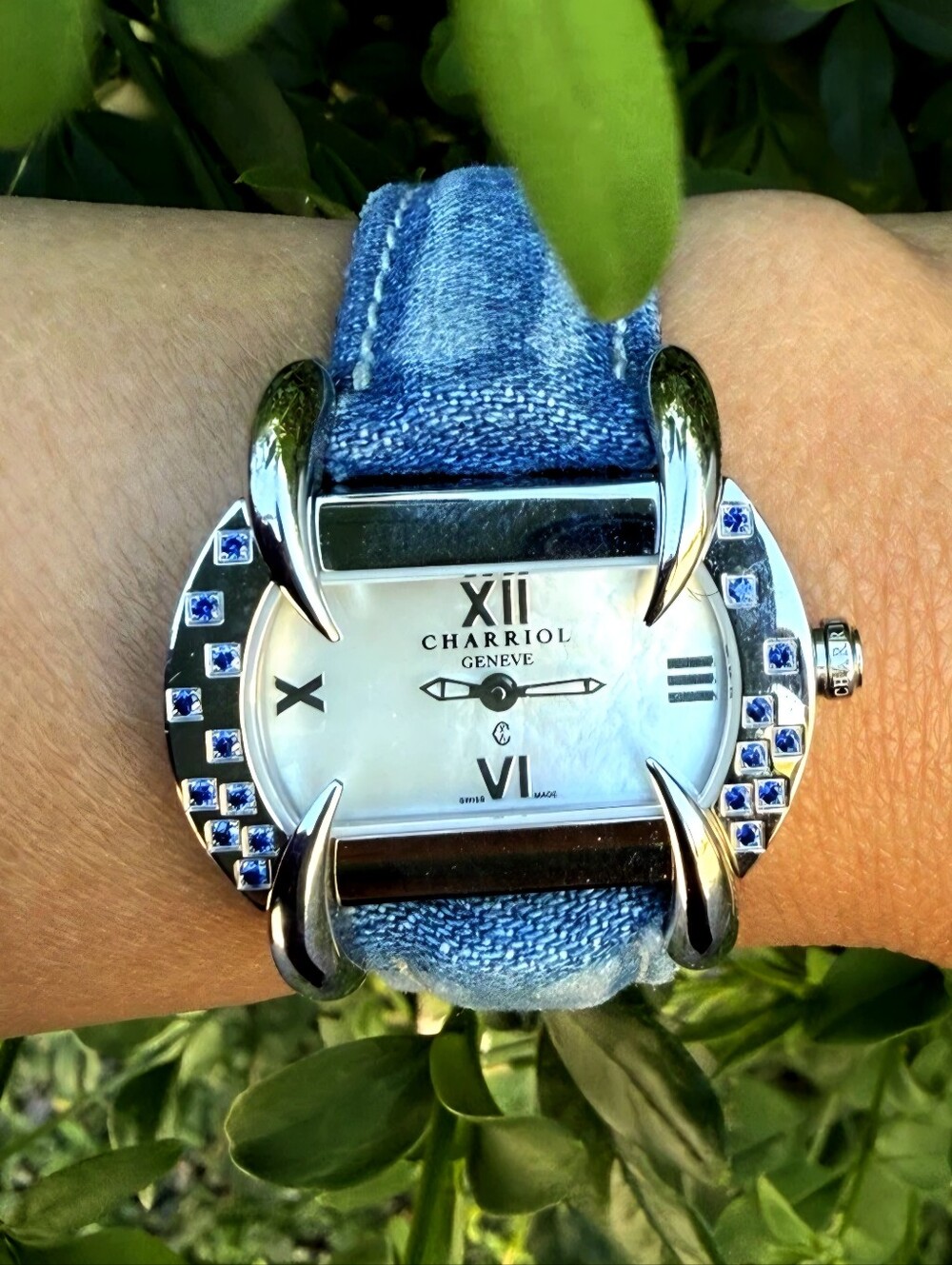 Charriol Geneve "Kucha" series women's watch featuring a blue sapphire-accented